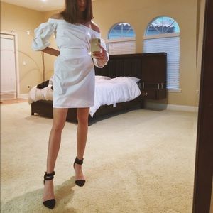 White dress with flounce sleeves